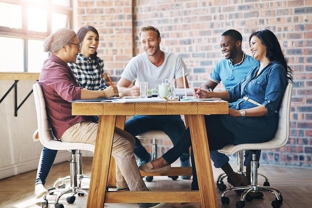 A group of diverse people sitting around a table in a bright, modern office, engaged in a discussion about labor regulations. They are looking at documents and screens, with pens and laptops on the table. The overall feeling is collaborative and focused.